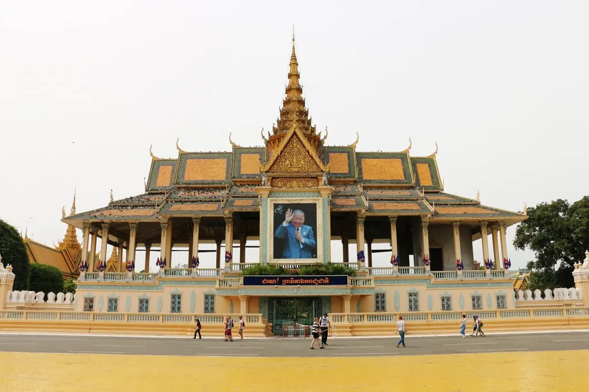 Royal Palace pavilion in Phnom Penh with a large royal portrait on its facade.