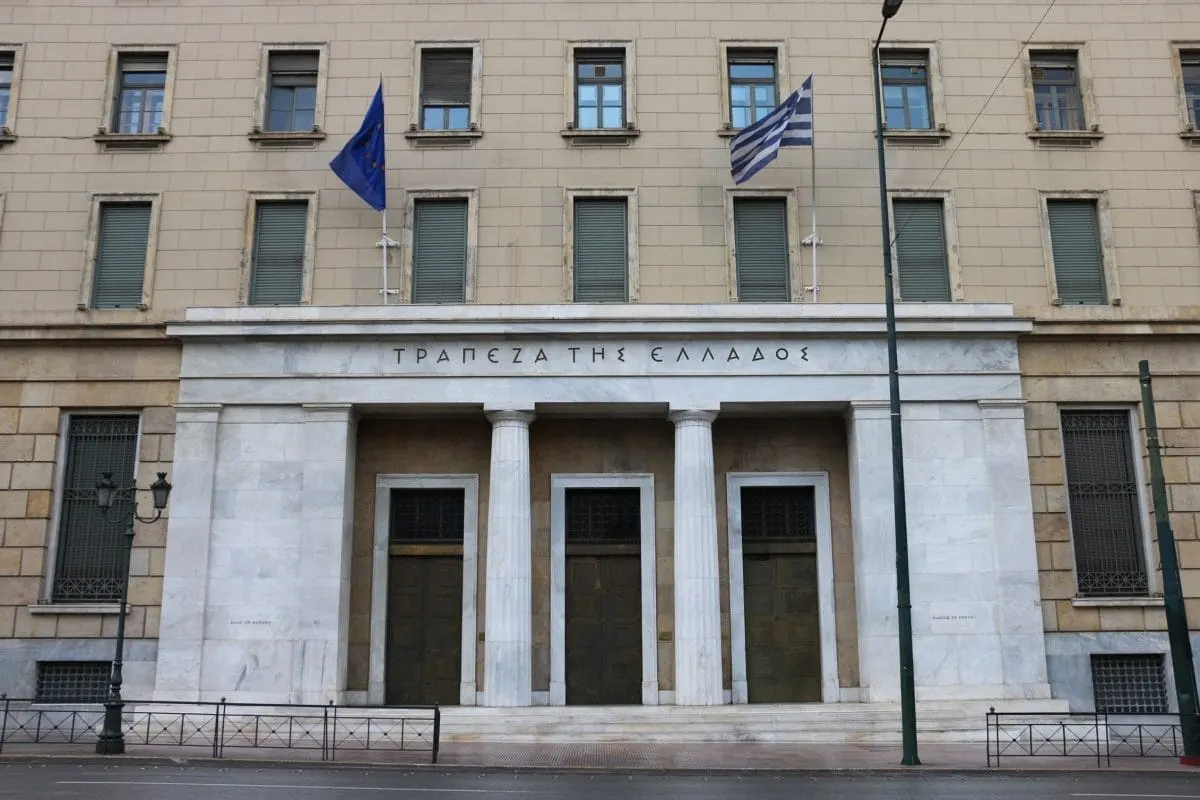 Marble entrance of the Bank of Greece with Greek and EU flags