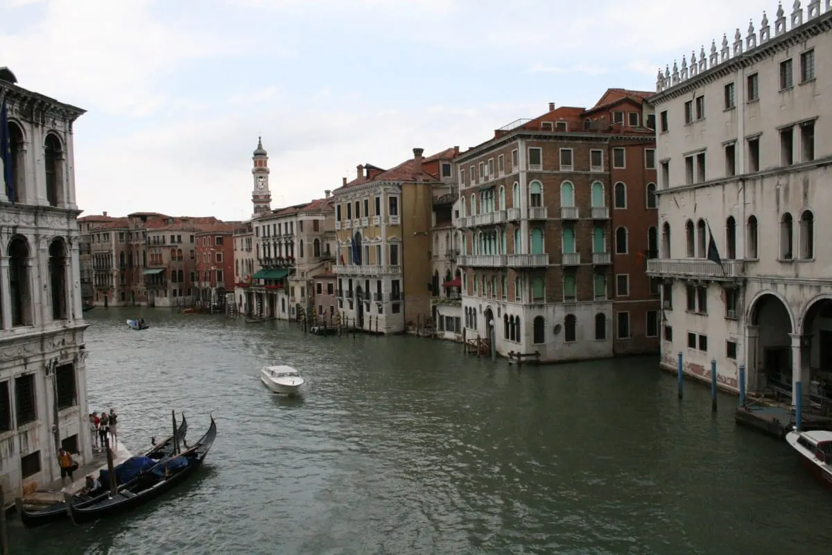 Palazzi lining the Grand Canal in Venice, with moored gondolas below.