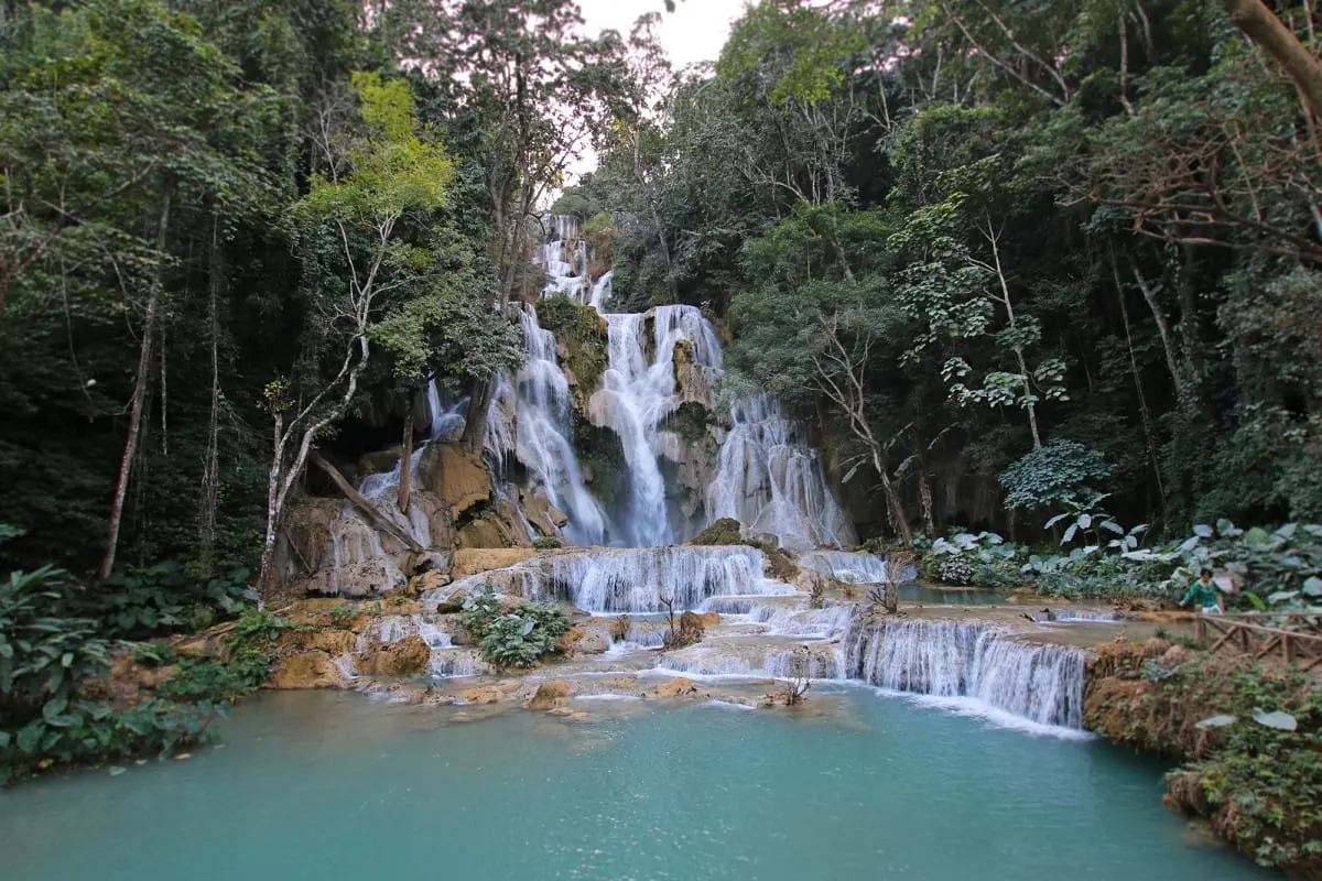 Main waterfall of Kuang Si Falls cascading into a turquoise pool