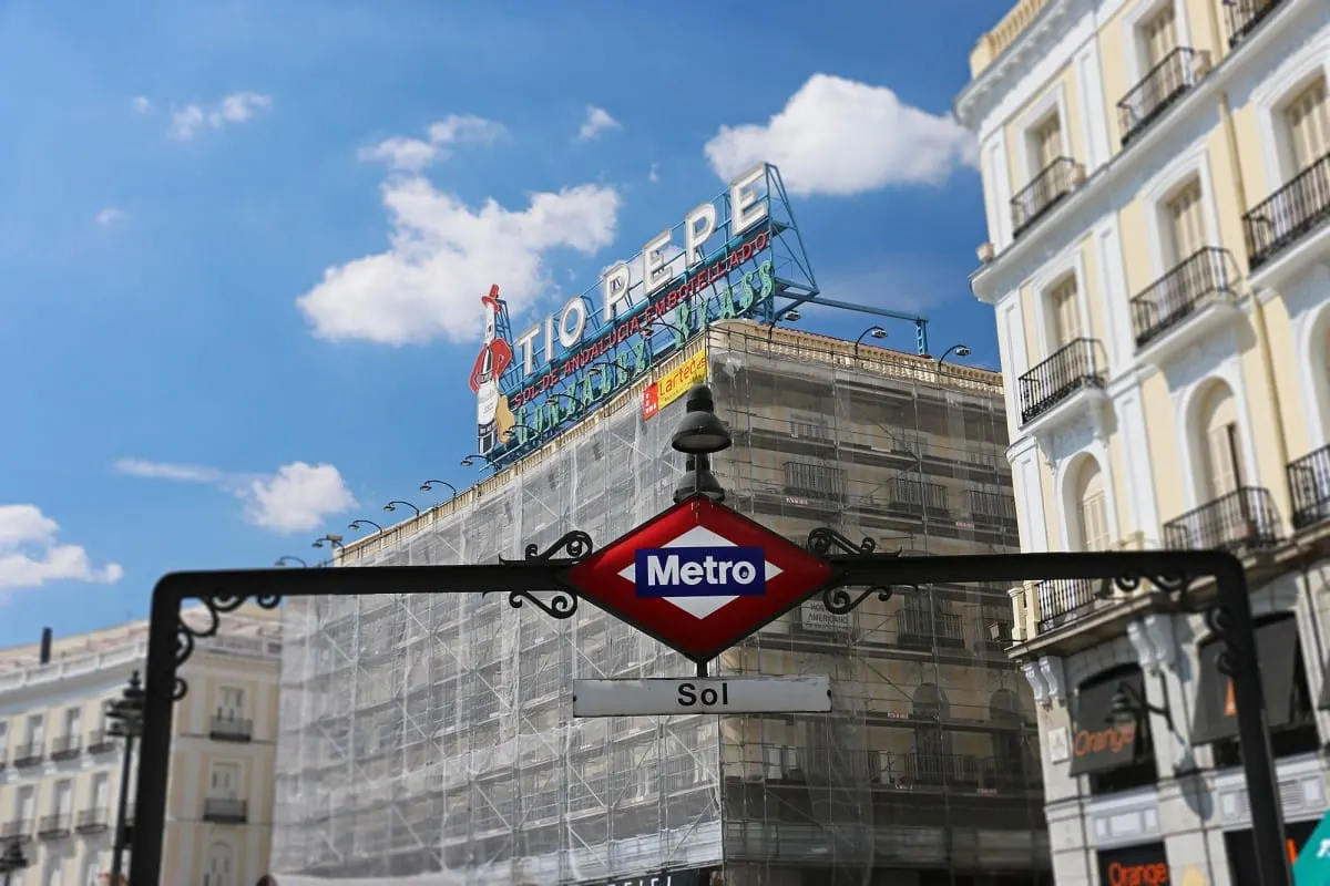 Sol metro sign before the Tio Pepe neon sign, Puerta del Sol, Madrid