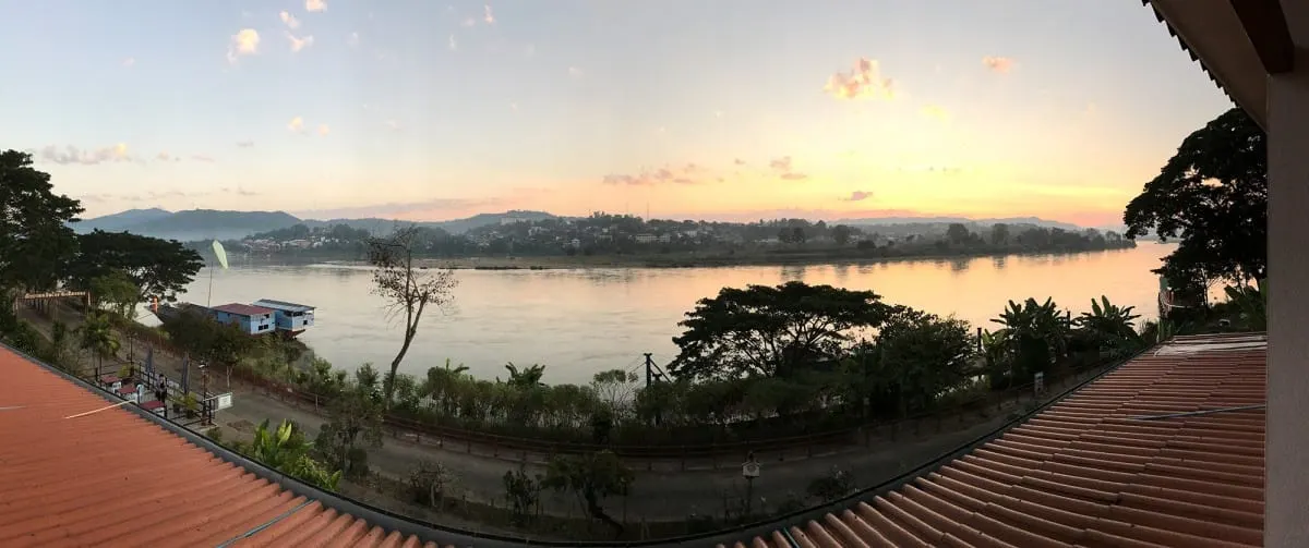 Panorama of the Mekong riverside promenade at Chiang Khong at dusk